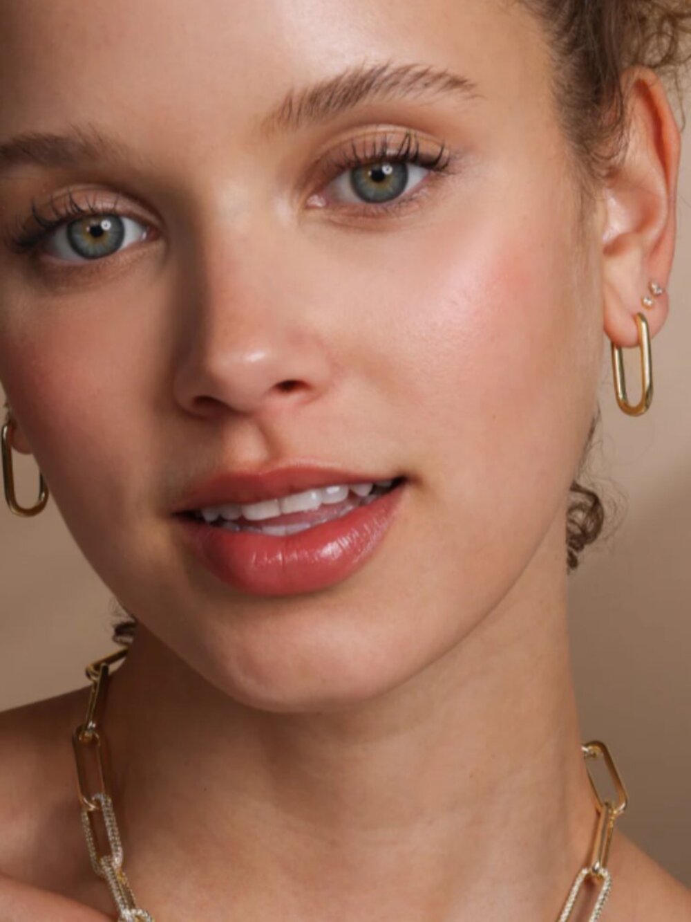 Melinda Maria Polished Gold Elongated Rectangular Hoop Earrings